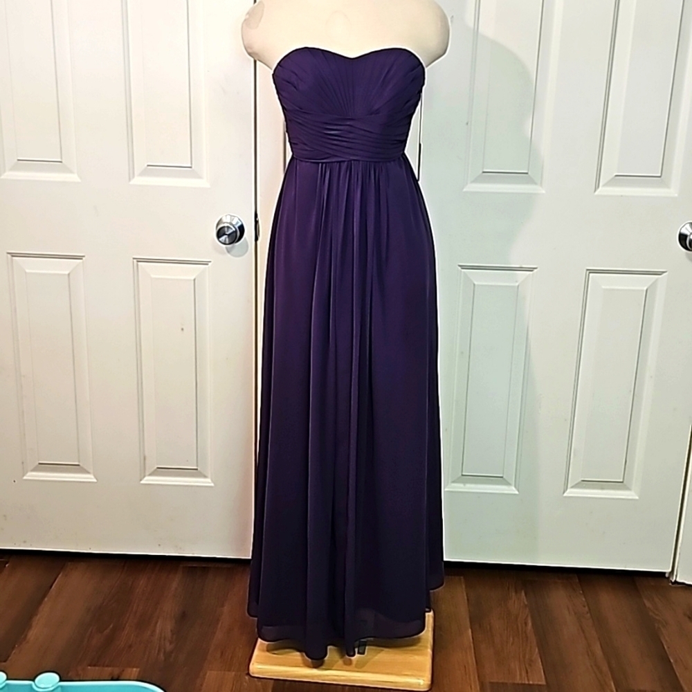 Purple strapless gown size‎ 2. Sheer overlay.  Fitted at the bust. DAVIDS…